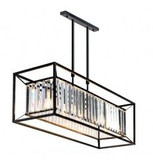 لوستر آویز خطی مستطیلی با فریم فلزی مشکی و کریستالهای شفاف روشن در پس زمینه دیوار آجری تیره.