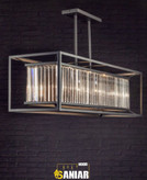 لوستر آویز خطی مستطیلی با فریم فلزی مشکی و کریستالهای شفاف روشن در پس زمینه دیوار آجری تیره.