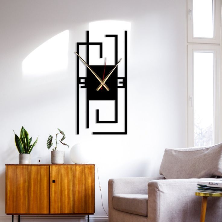 ساعت-دیواری-گرافیک-فلزی-مدرن-مشکی-طلایی-مینیمال