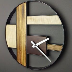 ساعت دیواری فلزی مدرن طرح دایره‌ای و مینیمال